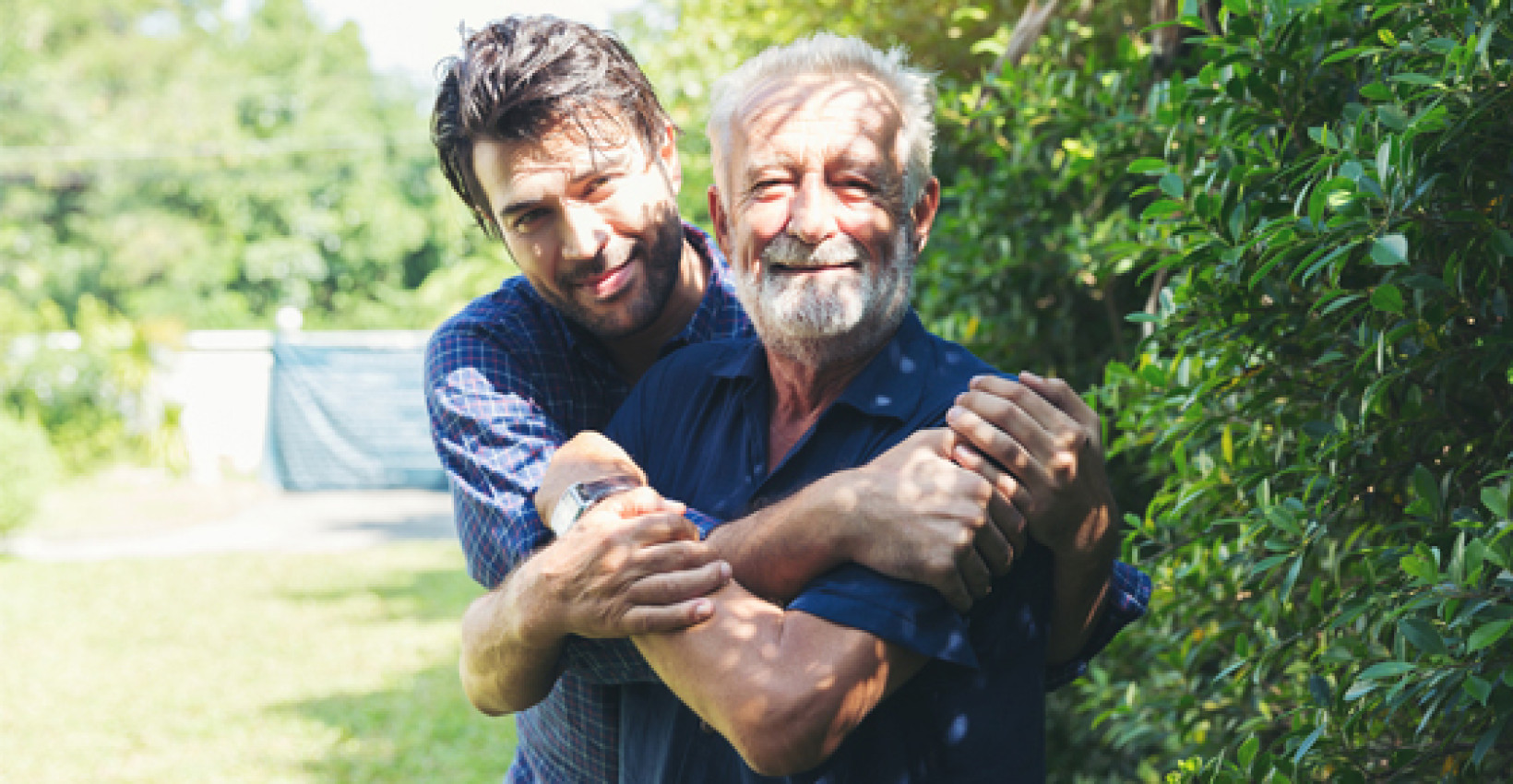 father and son smile