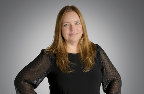 A headshot of Caitlin Moore