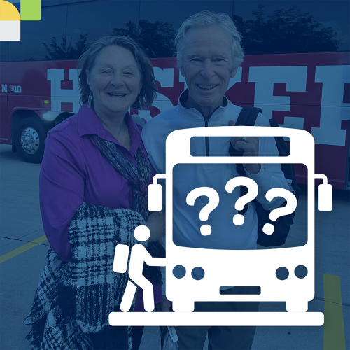 two people stand in front of a bus with a blue overlay over the image