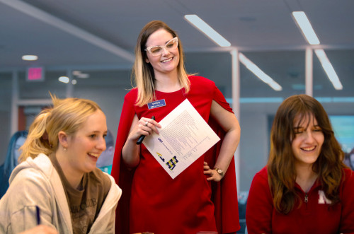 Brittany Planos leading a financial literacy workshop