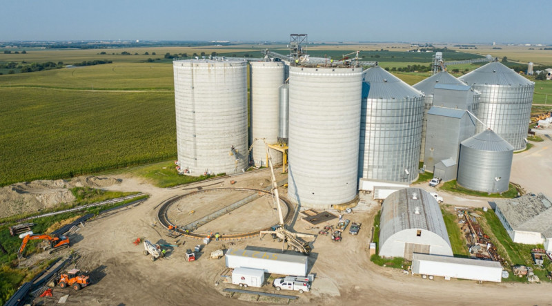 An aereal shot of a construction site near grain elevators