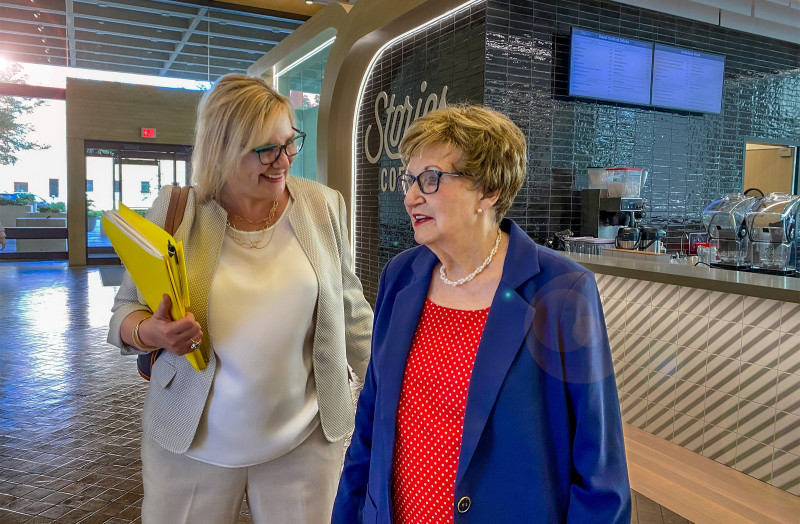 Carolyn and Kelly walk around Union Bank Place