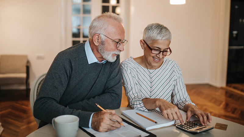 a couple looks over some paperwork