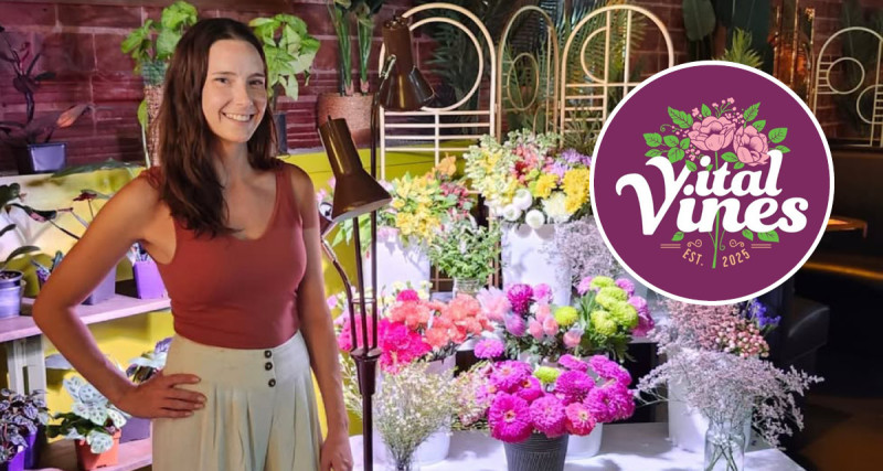 Sydney Vecchio stands in front of plants with the vital vines logo overlayed 