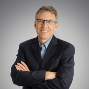 A headshot of Michael Henkenius