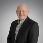 A headshot of Erik Wiedel