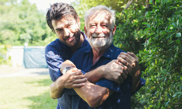 father and son smile