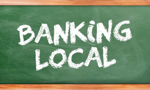 a green chalk board that has the words banking local on it